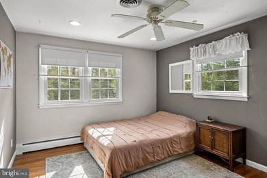 Welcome to this spacious 5-bedroom, 2.5-bath home nestled in the - photo 25