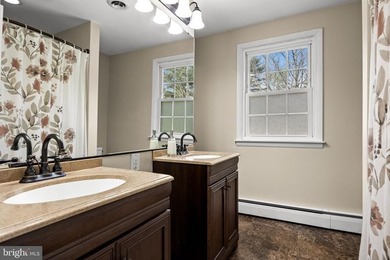 Welcome to this spacious 5-bedroom, 2.5-bath home nestled in the - photo 27
