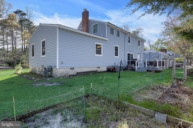 Welcome to this spacious 5-bedroom, 2.5-bath home nestled in the - photo 31
