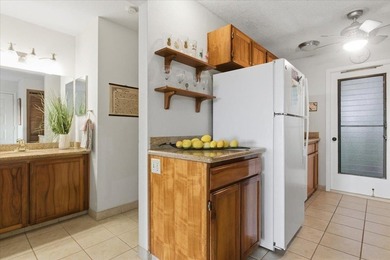 Tucked into the lush tropical grounds of Maui Hill, Unit - photo 17