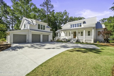 Discover unparalleled waterfront living in this custom-built - photo 2