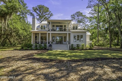 Discover unparalleled waterfront living in this custom-built - photo 3