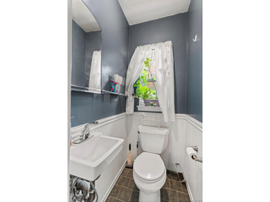 Welcome to 2027 Mayflower Avenue, a classic brick single family - photo 8