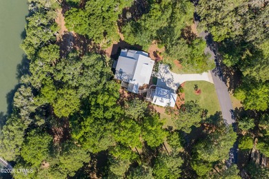 Discover unparalleled waterfront living in this custom-built - photo 9