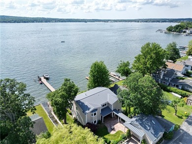 Perfectly positioned along Canandaigua Lake, this exceptional - photo 1