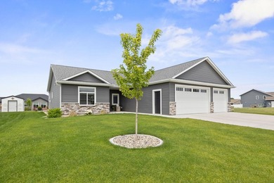 Enjoy the ease of one-level living in this beautifully designed - photo 1