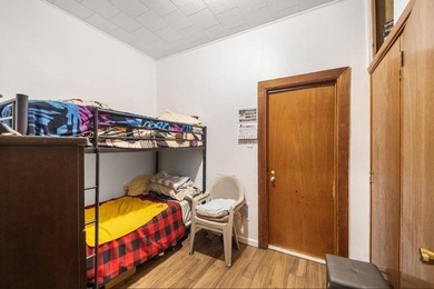 Solid brick two-family home, currently tenant-occupied-perfect - photo 13