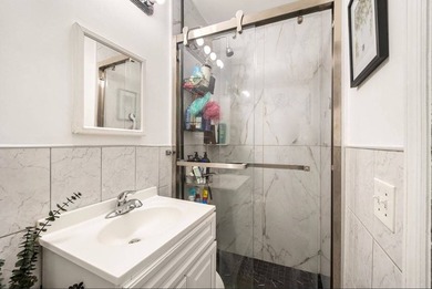 Solid brick two-family home, currently tenant-occupied-perfect - photo 15