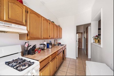 Solid brick two-family home, currently tenant-occupied-perfect - photo 17