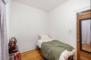 Solid brick two-family home, currently tenant-occupied-perfect - photo 26