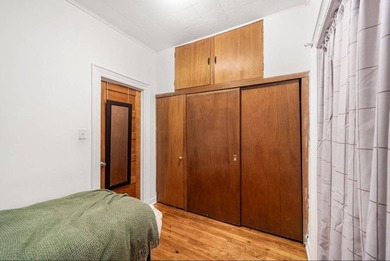 Solid brick two-family home, currently tenant-occupied-perfect - photo 27