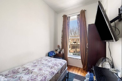 Solid brick two-family home, currently tenant-occupied-perfect - photo 28