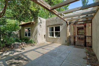Experience timeless Southwestern Charm on a full acre in