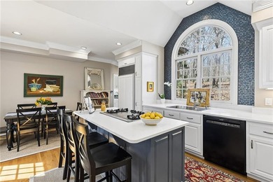 Welcome to 19 Summit Drive, a rare residence that artfully - photo 16