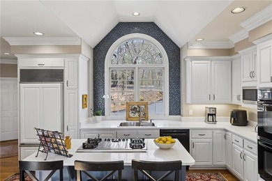 Welcome to 19 Summit Drive, a rare residence that artfully - photo 20