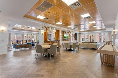 Welcome to a special Peloton West luxury condo - arguably the - photo 33