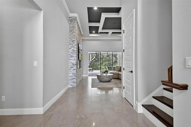 One-of-a-kind custom Gold Coast home, tucked within the private - photo 12