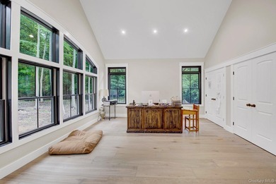Welcome to 301 Old Mill Road, a masterfully crafted custom-built - photo 12