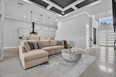 One-of-a-kind custom Gold Coast home, tucked within the private - photo 15