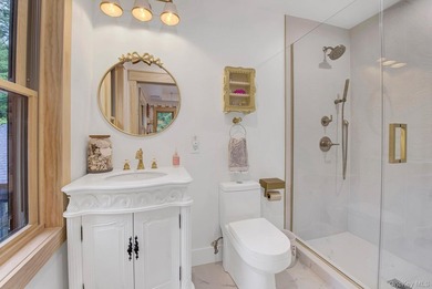 Welcome to 301 Old Mill Road, a masterfully crafted custom-built - photo 15