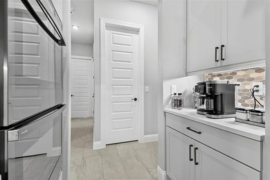 One-of-a-kind custom Gold Coast home, tucked within the private - photo 25