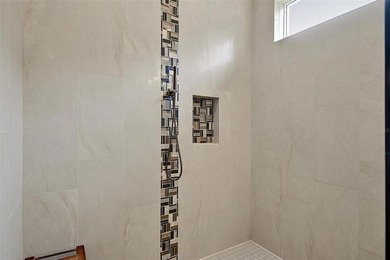 One-of-a-kind custom Gold Coast home, tucked within the private - photo 37