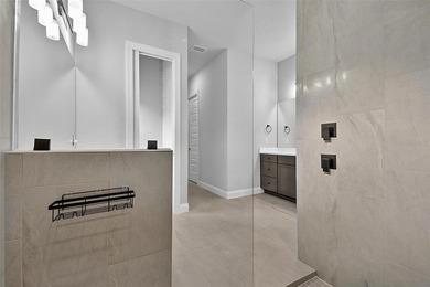 One-of-a-kind custom Gold Coast home, tucked within the private - photo 38