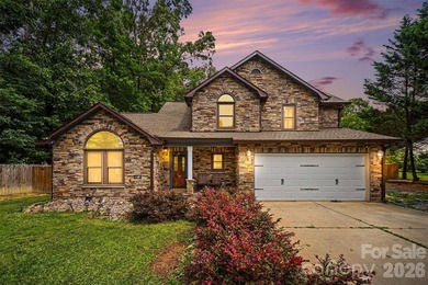 Nestled on approximately half an acre, this beautifully - photo 1