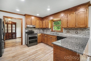 Nestled on approximately half an acre, this beautifully - photo 3