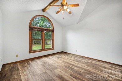Nestled on approximately half an acre, this beautifully - photo 10