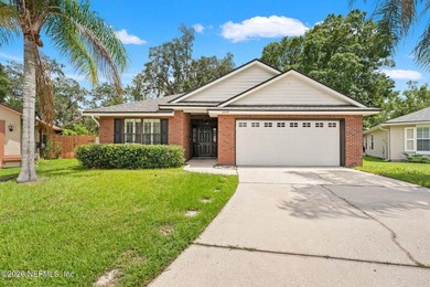 Welcome home to Bay Harbor! This spacious 4 bedroom, 2 bath - photo 1