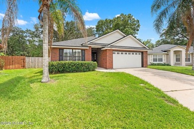 Welcome home to Bay Harbor! This spacious 4 bedroom, 2 bath - photo 3