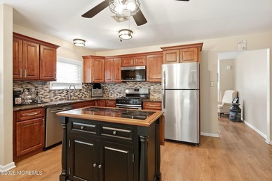 Experience worry-free living in this METICULOUSLY RENOVATED - photo 15