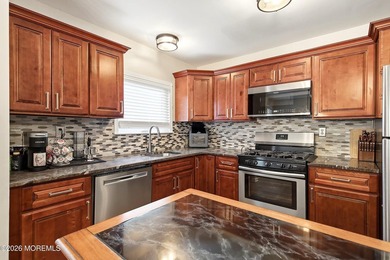 Experience worry-free living in this METICULOUSLY RENOVATED - photo 16
