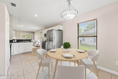 Welcome home to Bay Harbor! This spacious 4 bedroom, 2 bath - photo 7