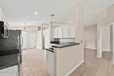 Welcome home to Bay Harbor! This spacious 4 bedroom, 2 bath - photo 9
