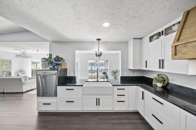 Welcome to this beautifully renovated 4-bedroom, 2-bath - photo 5