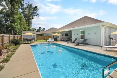 Gold Fortified pool home with a private wooded backdrop and - photo 7