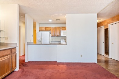 This 5th-floor corner unit offers exceptional views and