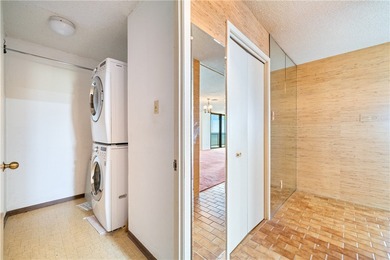 This 5th-floor corner unit offers exceptional views and
