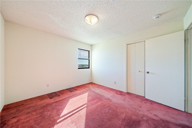 This 5th-floor corner unit offers exceptional views and