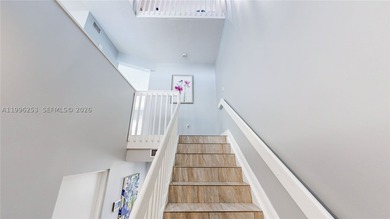 Welcome to this beautiful tri-level townhome condo featuring 3 - photo 6