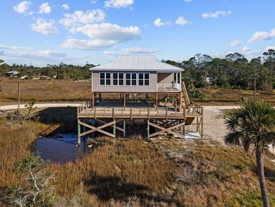 Rare opportunity in Ezell Beach! This elevated two-bedroom, one - photo 5