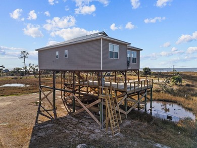 Rare opportunity in Ezell Beach! This elevated two-bedroom, one - photo 6