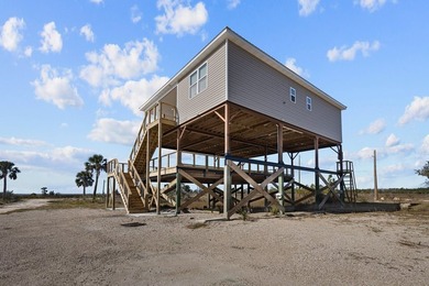 Rare opportunity in Ezell Beach! This elevated two-bedroom, one - photo 7