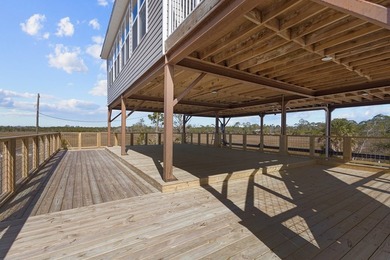 Rare opportunity in Ezell Beach! This elevated two-bedroom, one - photo 10