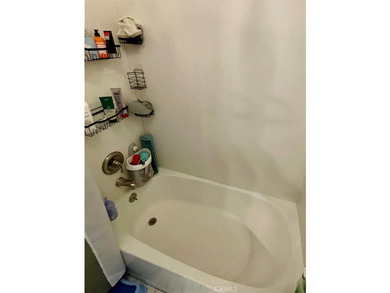Welcome to this beautifully updated end-unit condo in the - photo 13