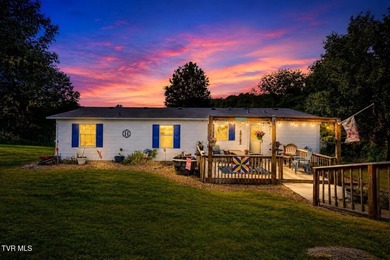 Perched on over 2 acres with breathtaking mountain views, this - photo 1