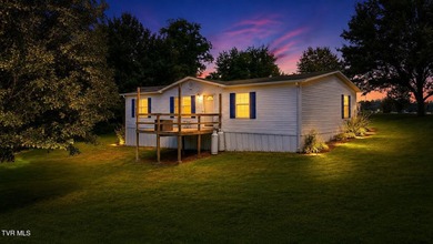 Perched on over 2 acres with breathtaking mountain views, this - photo 2