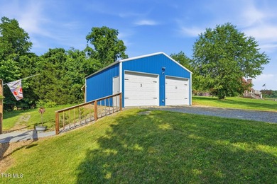 Perched on over 2 acres with breathtaking mountain views, this - photo 8